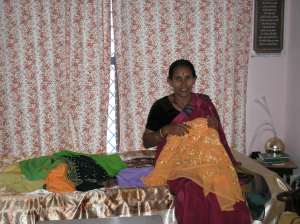 Rekha's mother sewing the girls dresses for our wedding